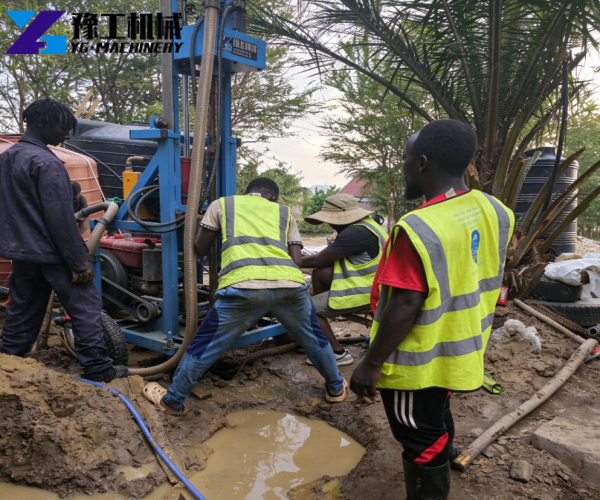 small water well drilling rig on site working